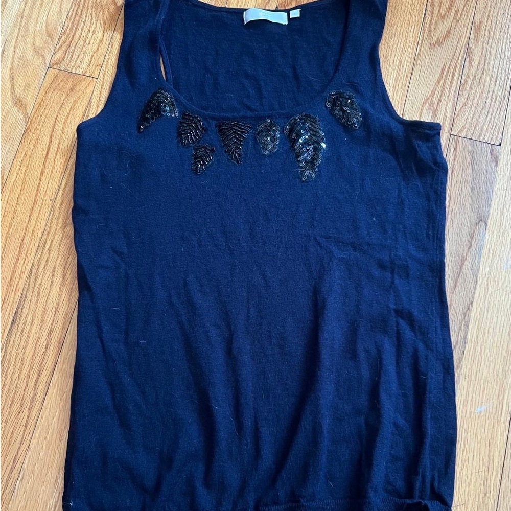 Elegant marine wool tank top with sequence appliqué around the neckline